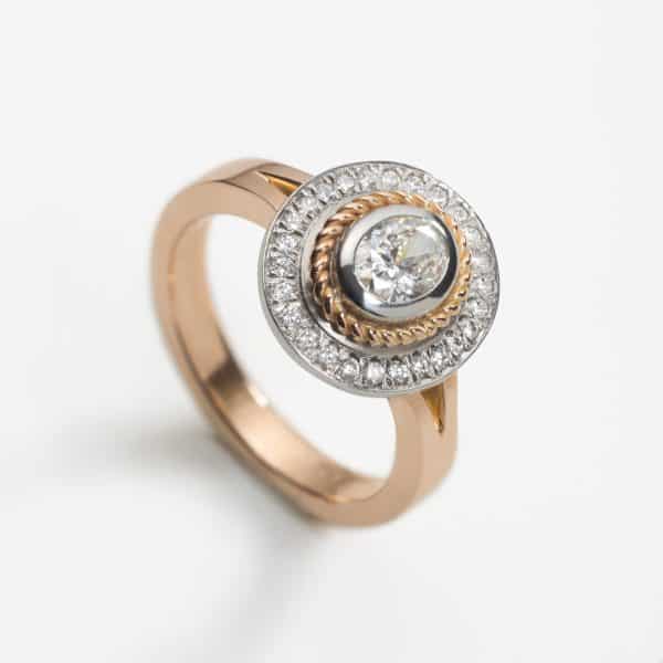 Designworks Studio Tuula Harrington 18ct rose gold and platinum halo engagement ring with 0.50ct oval diamond, rose gold braid and diamond halo