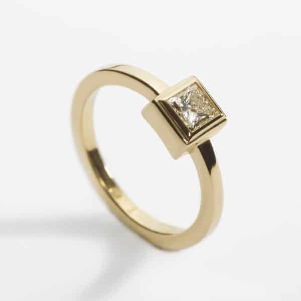 18ct yellow gold solitaire engagement ring with 0.40ct princess cut diamond, D colour