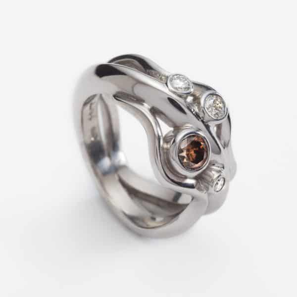 Designworks studio 18ct white gold wave ring with 0.38ct cognac diamond and 0.19ct diamonds