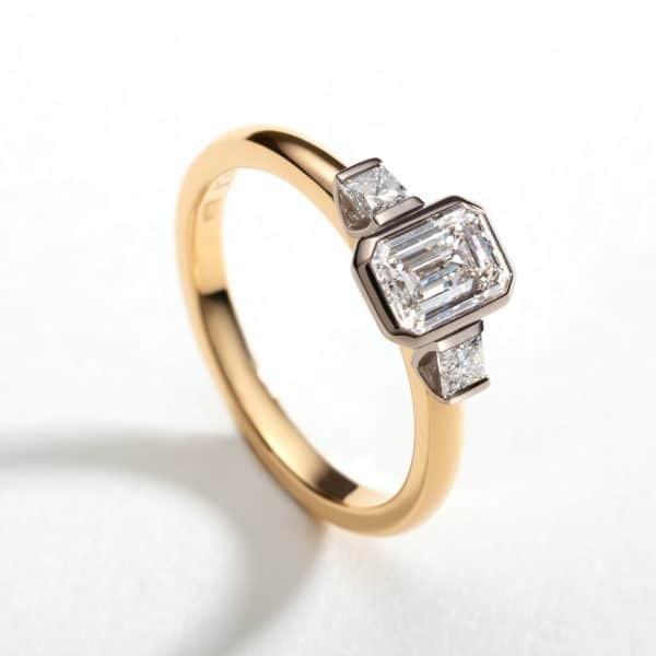 Brannock 18ct yellow gold 0.80ct emerald cut diamond, 2.5mm princess