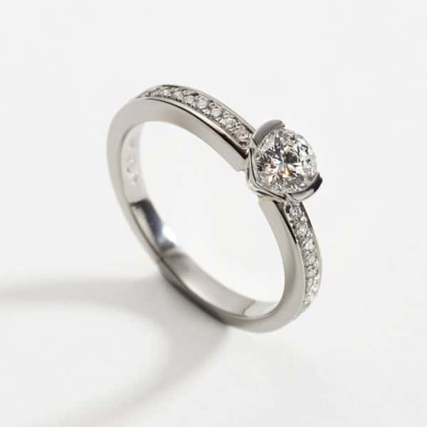 Platinum Diamond Engagement Ring with Pavé Set Diamond Shoulders