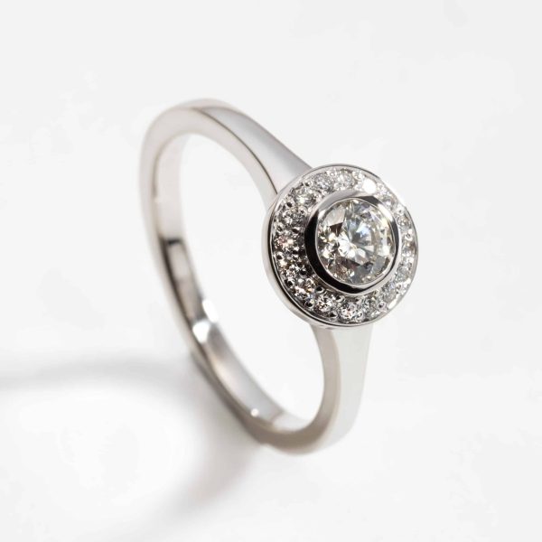 18ct white gold diamond halo with rubover setting