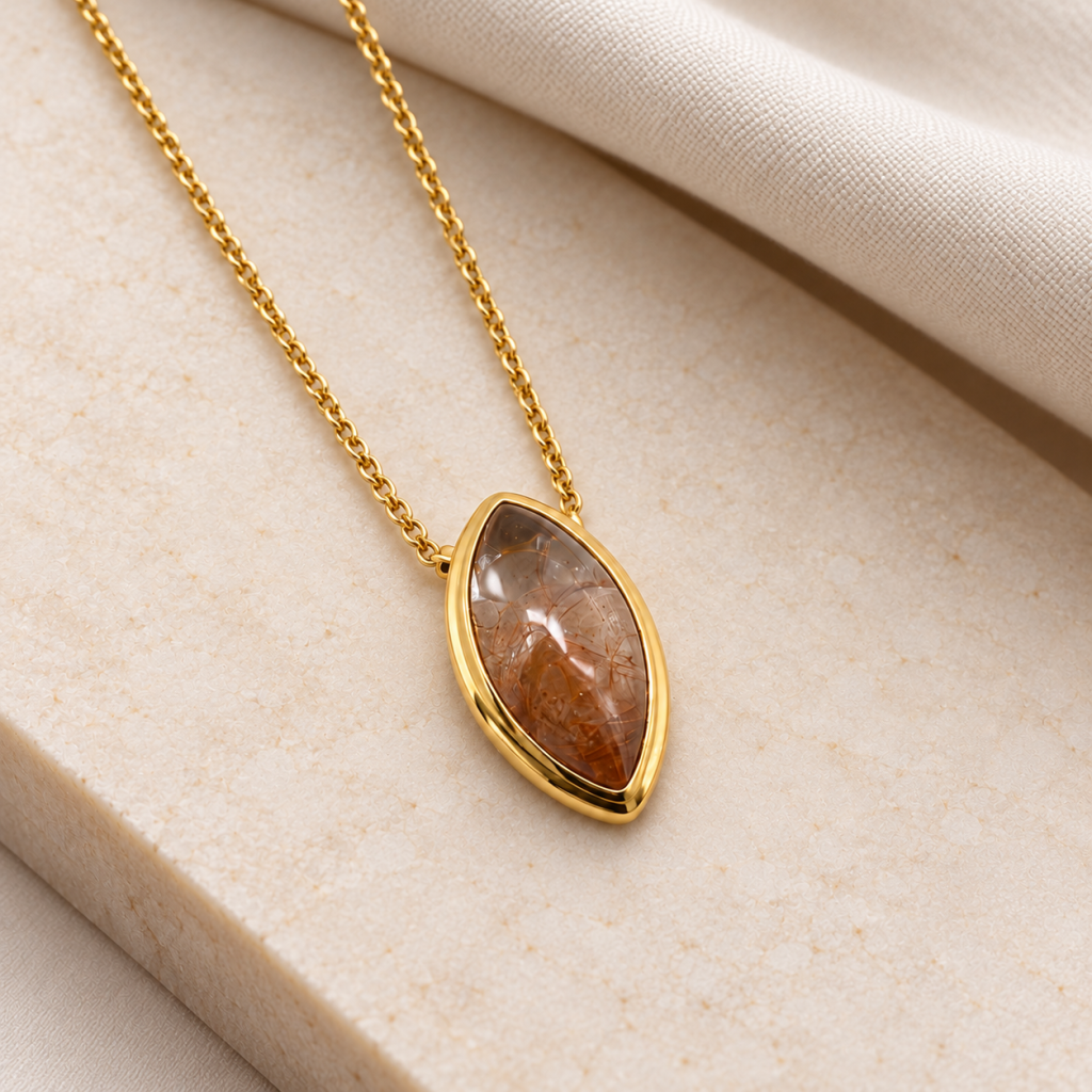 Pendant, 23ct, Marquise cut cabochon, Zircon, mounted in 18ct yellow gold setting